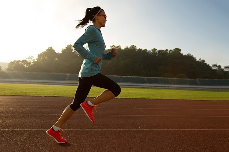 Lactate Threshold Testing Female Runner on Track